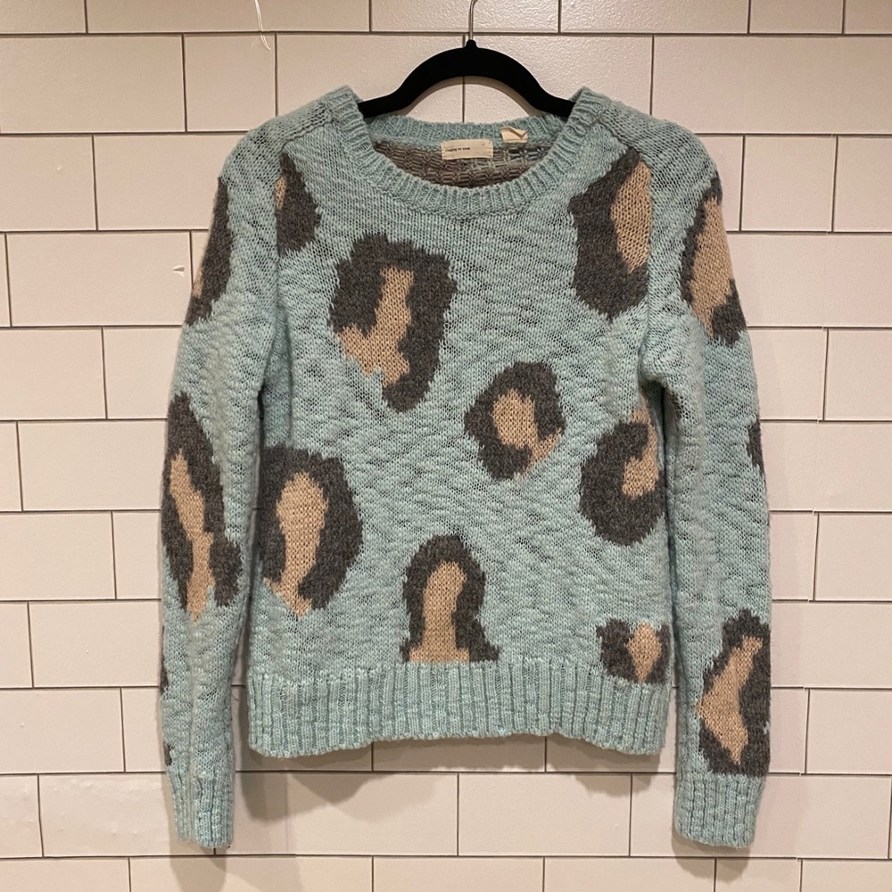 sleeping on snow sweater